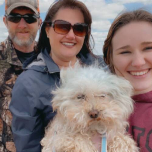 Nicole Proctor with husband, daughter and dog